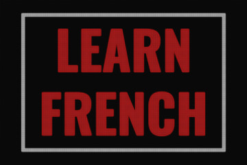 Fototapeta premium Learn French word on dark screen