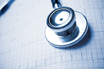 Electrocardiogram and stethoscope