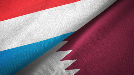 Fototapeta na wymiar Luxembourg and Qatar two flags textile cloth, fabric texture