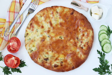 Khachapuri flatbread is national flour dish in Georgia isolated on white background, top view