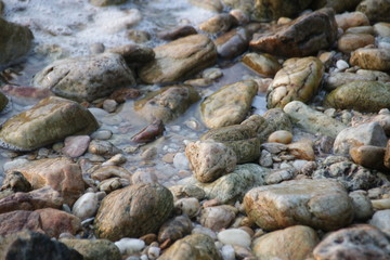 Pebbles by the beach , Strolling by the Sea on Summer Holidays