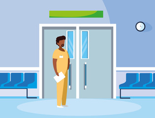 black male medicine worker with uniform in elevator door