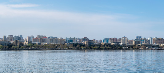 Baku, Azerbaijan - April 13, 2019: Panoramic sunny summer view of Baku, capital city of Azerbaijan. Panorama Baku from The Caspian Sea