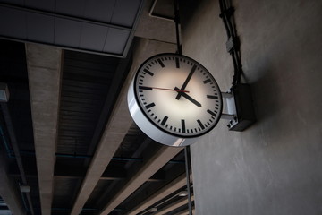 circle vintage old clock at train station in Bangkok Thailand