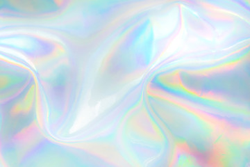 Abstract trendy holographic background. Real texture in pale violet, pink and mint colors with...