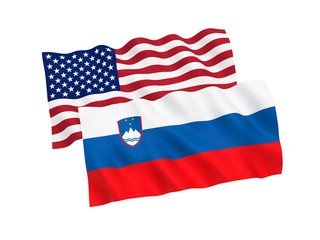 National fabric flags of Slovenia and America isolated on white background. 3d rendering illustration. 1 to 2 proportion.