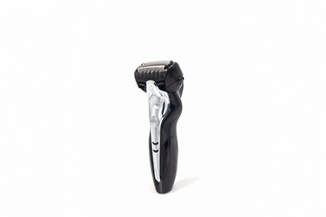 Electric shaver on white background.