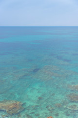 Fototapeta na wymiar The Beautiful Turquoise Blue Mediterranean Sea on the Southern Italian Coast