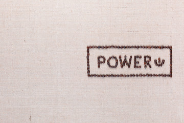 Middle right aligned power button made from coffee beans