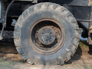 Fototapeta na wymiar Big tire of a construction vehicle