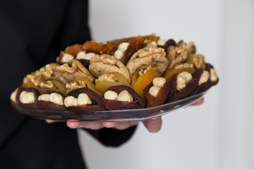 the special dried fruits and nuts plate concept for store seller. dried apricot,fig ,hazelnut, nut,special Turkish east food.