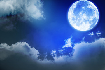 Naklejka na ściany i meble Full moon with blurred cloud and stars in the dark night
