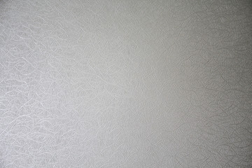 beige embossed paper background with chaotic lines