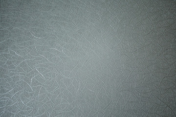 beige embossed paper background with chaotic lines