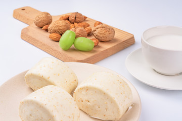 Dried fruit and milk bread on a white background