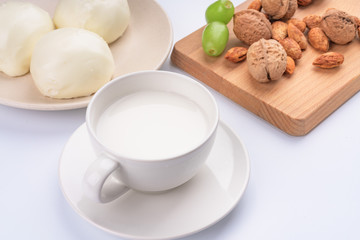 Dried fruit and milk bread on a white background