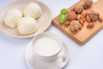 Dried fruit and milk bread on a white background