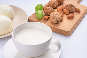 Dried fruit and milk bread on a white background