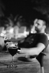 Wine glass on the table at night