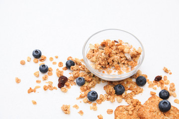 Crispy muesli cookies and blueberry Breakfast cereals isolated on white background, selective focus, top view