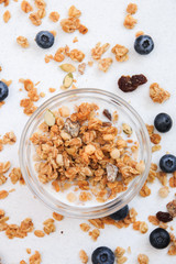 Crunchy muesli and blueberry Breakfast cereals isolated on white background, selective focus, top view