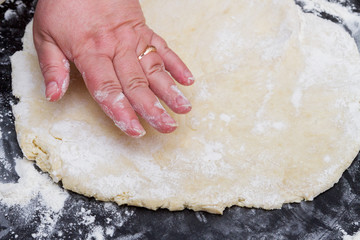 Cooking cottage cheese cookies at home by a woman chef