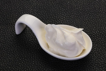 Sour cream in the bowl