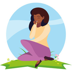 beautiful black woman seated in the park