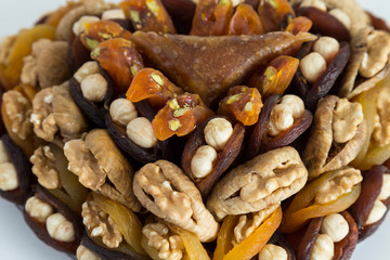the special dried fruits and nuts plate concept for store seller. dried apricot,fig ,hazelnut, nut,special Turkish east food.