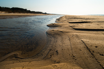 Dessert like textured sand - Baltic sea gulf beach with white sand in the sunset