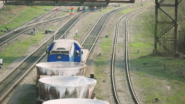 the train transports empty slag bowls to the blast furnace shop