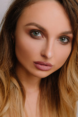 Obraz premium Woman with Beautiful Evening Makeup& Luxury Salon Style. Sexy Lips and Eyes