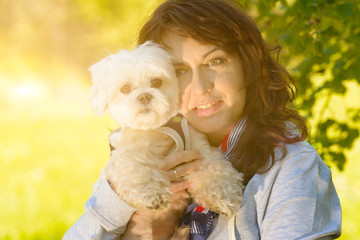 Dog playing with his owner