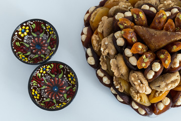Fototapeta na wymiar the special dried fruits and nuts plate concept for store seller. dried apricot,fig ,hazelnut, nut,special Turkish east food.