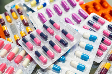pharmaceuticals pills medicine /colorful capsules on white background /capsule pill medicine