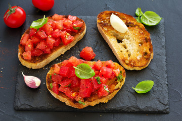 Bruschetta with tomatoes and basil.
