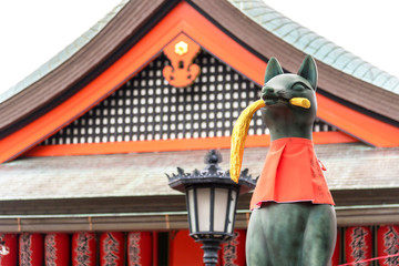 Fox statue of god at Fushimi Inari Taisha Shrine in Kyoto, Japan
