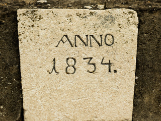 Old stone with engraved inscription or date Anno 1834