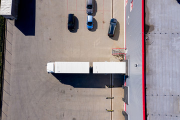 Large distribution hub, trucks and trailers. Aerial View
