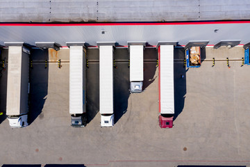 Large distribution hub, trucks and trailers. Aerial View