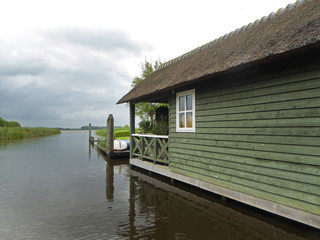 Fototapeta na wymiar Gieterhoorn watervillage Overijssel Netherlands boathouse