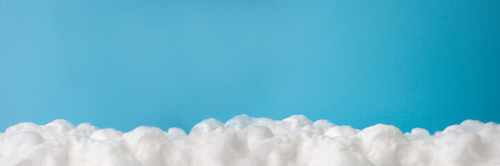cloud made out of cotton wool on sky blue background