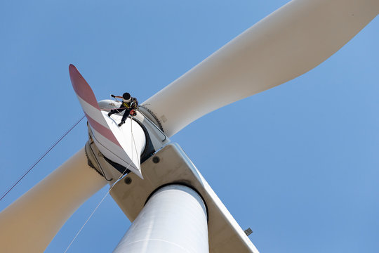worker at wind power blade