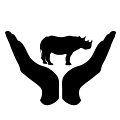 Vector silhouette of a hand in a defensive gesture protecting a rhinoceros. Symbol of animal, wild,africa, nature, humanity, care, protection, veterinary.