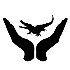 Vector silhouette of a hand in a defensive gesture protecting a crocodile. Symbol of animal, wild, nature, humanity, care, protection.