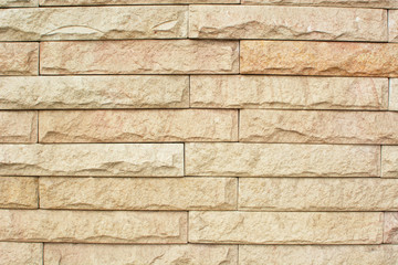 closeup brick wall texture background cream olor