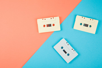 retro audio cassette tape on color background