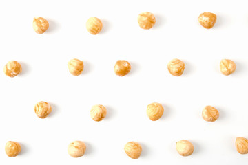 Nuts pattern - hazelnut on white background.