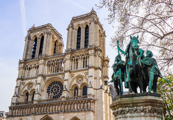 Fototapeta na wymiar Notre Dame Cathedral and Charlemagne and his Guards statue. Before the fire. April 05, 2019. Paris France