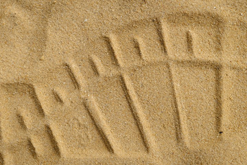 Footprint of shoe the sand texture